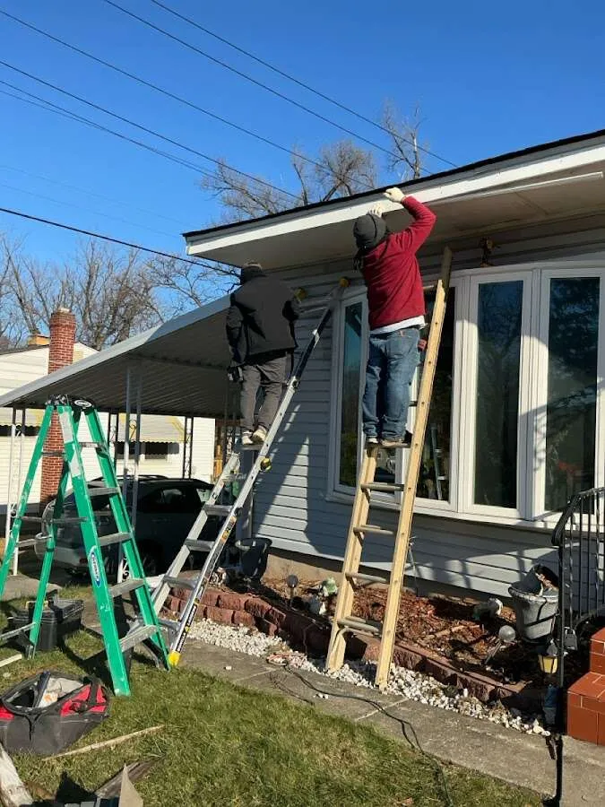 Restoration crew performing exterior repair in Cloquet